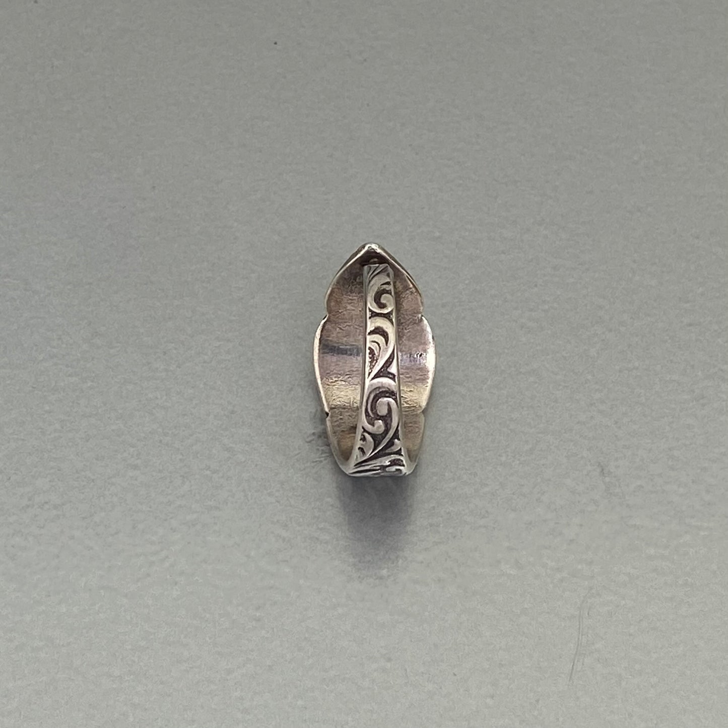 Initial ring E, curly