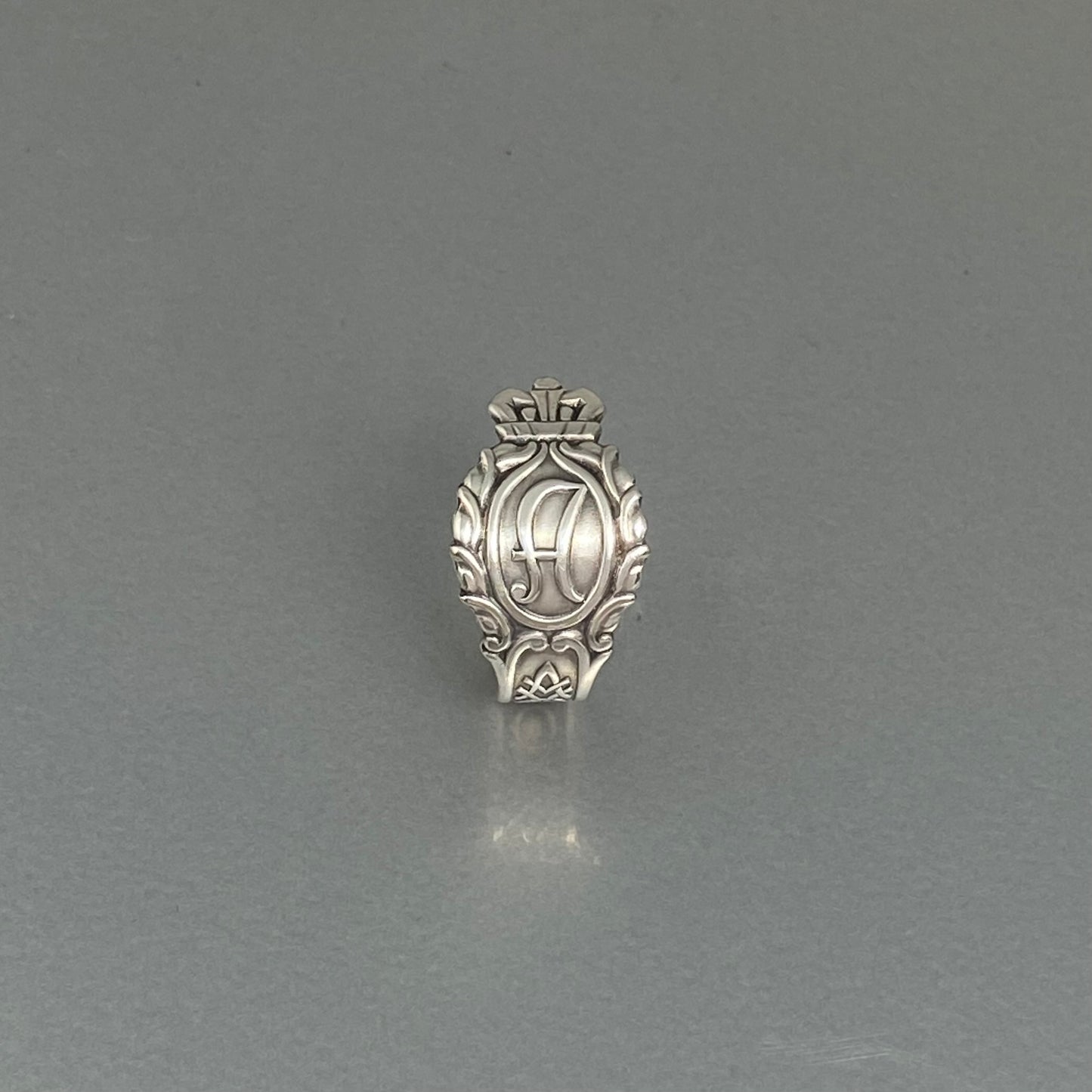 Initial A, crown