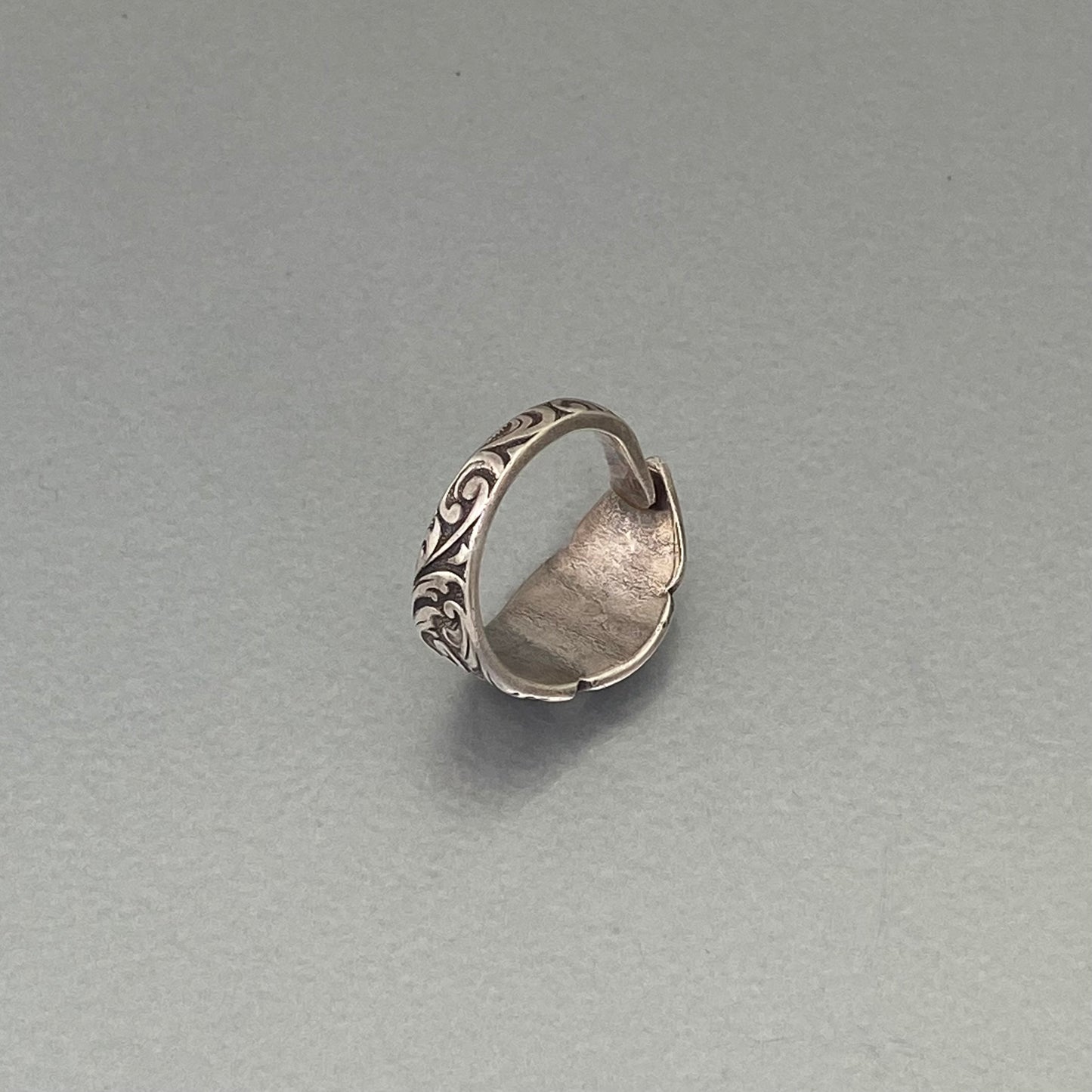 Initial ring E, curly