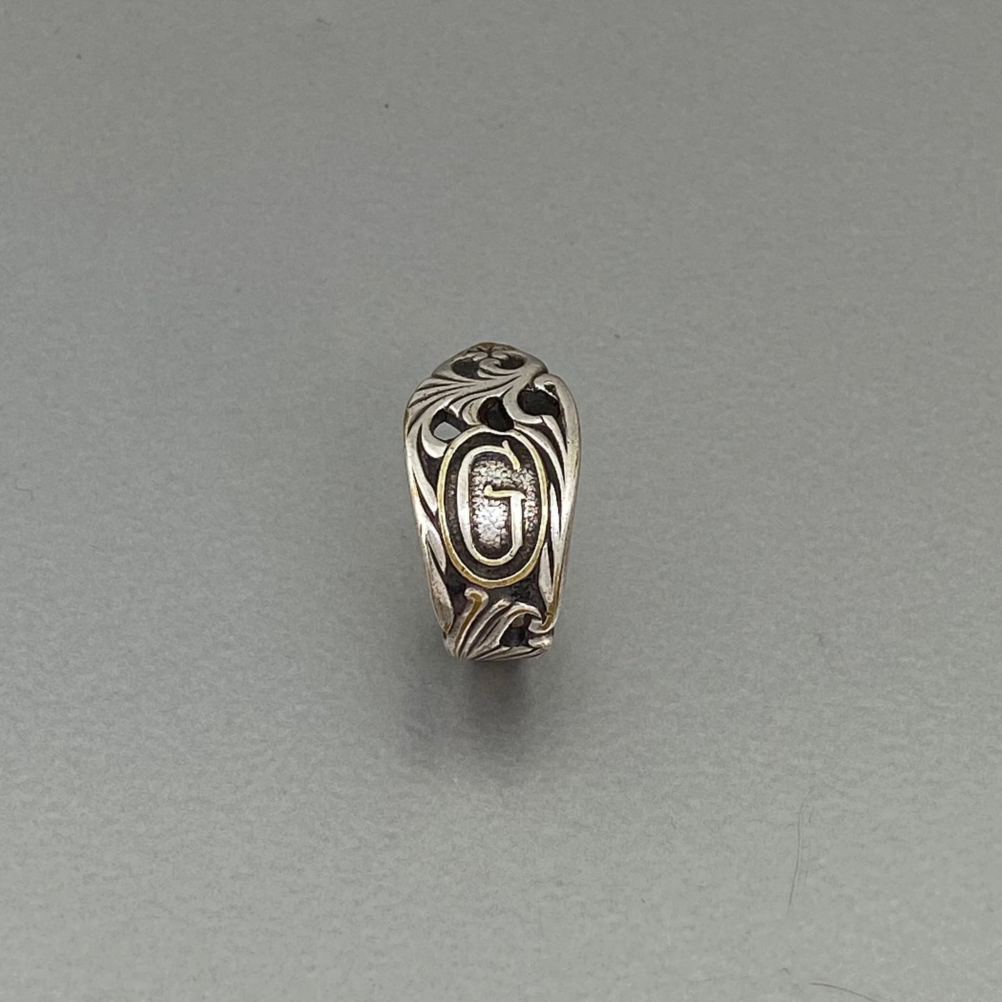 initial ring G open