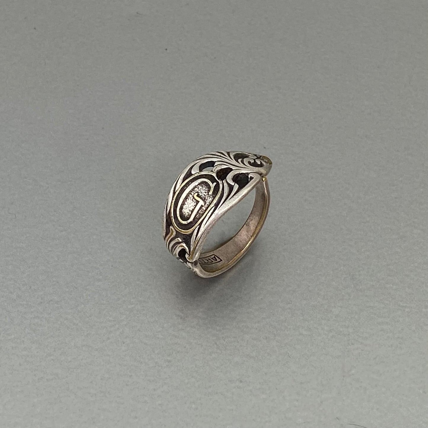 initial ring G open