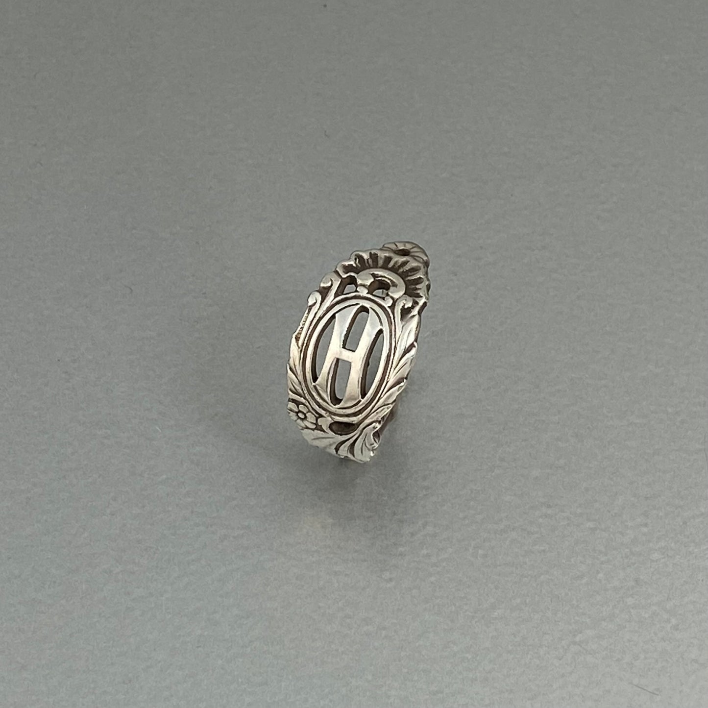 Initial ring H open